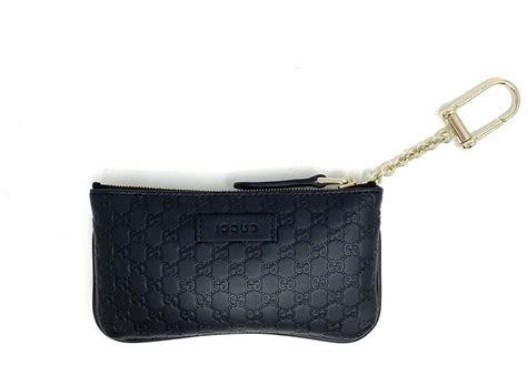 black gucci key pouch